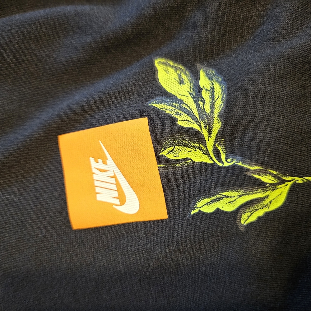 Nike Black T-Shirt with Leaf Design